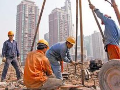 Trabajadores de la construcción en Shanghai