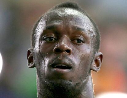 Usain Bolt al finalizar la serie clasificatoria de 100 metros.