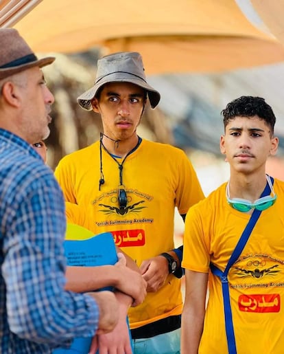 Amjed Tantish (left) speaks with Yazan Al Kaseeh (right) during a 2023 training session. The young man died after being shot fatally in 2024 in the northern Gaza Strip.