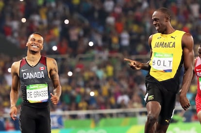 El jamaicano Usain Bolt y el canadiense Andre de Grasse compiten en la semifinal de 200 metros lisos. 