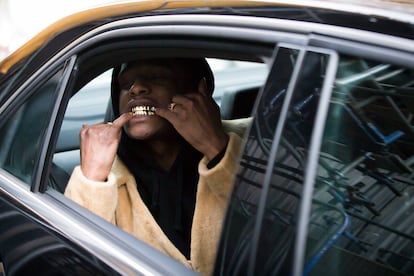 Rapper A$AP Rocky displays his gold teeth in London, in 2016.
