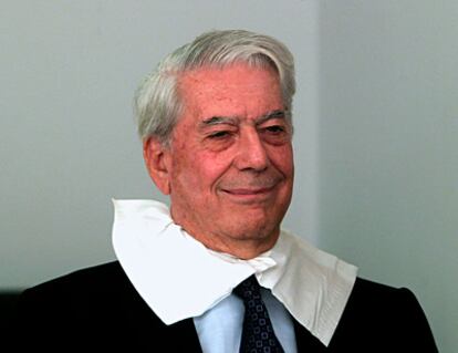 Mario Vargas Llosa waits to have make-up applied before a televised interview after hearing he had won the Nobel Prize.