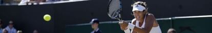 Muguruza, durante un partido en Wimbledon.