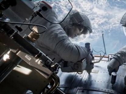 Sandra Bullock and George Clooney in Alfonso Cuarón's Gravity.