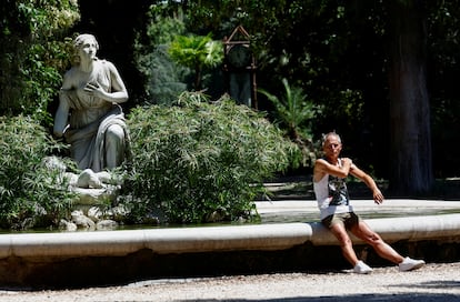 A man cools off at Villa Borghese during a heatwave across Italy, in Rome, Italy July 11, 2023.