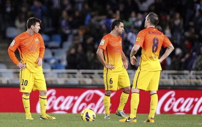 Messi, Xavi e Iniesta, cariacontecidos en Anoeta