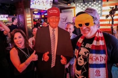 Donald Trump supporters celebrate the election results in New York early Wednesday morning.