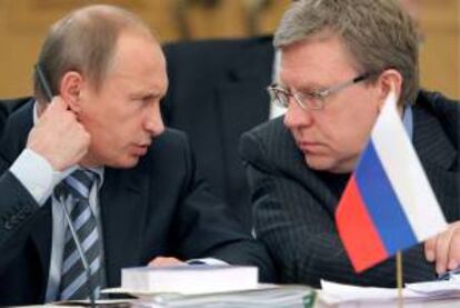 El presidente ruso, Vladimir Putin, y el exministro de Finanzas de Rusia, Alexey Kudrin. EFE/Archivo