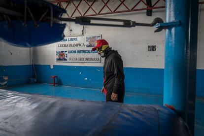 Super doll fighter walks in a gym in Mexico City