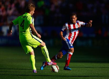 Rakitic y Koke