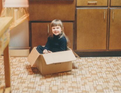 Vintage Child Playing in Cardboard Box on Kitchen Floor, Candid Portrait Little Girl 1980s