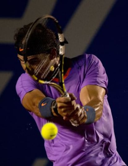 Rafael Nadal of Spain hits a return to Diego Sebastian Schwartzman of Argentina at the Mexico ATP Open.