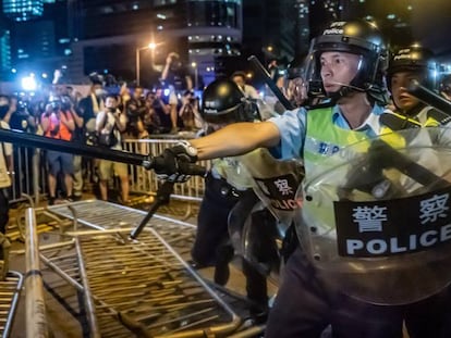 Riot police and protestors during a demonstration last week in Hong Kong.