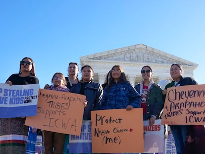 Demonstrators stand outside of the U.S. Supreme Court, as the court hears arguments over the Indian Child Welfare Act, on November 9, 2022, in Washington.