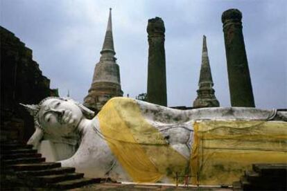 Estatua de Buda en la ciudad tailandesa de Ayuthaya, declarada patrimonio de la humanidad por la Unesco.