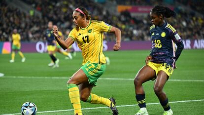 Jamaica's Allyson Swaby drives the ball past Colombian Linda Caicedo, one of the sensations of the tournament.