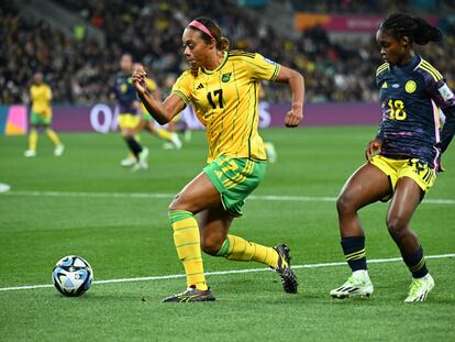 Jamaica's Allyson Swaby drives the ball past Colombian Linda Caicedo, one of the sensations of the tournament.