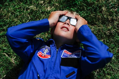 A child watches a solar eclipse on August 21, 2017 in Nashville.