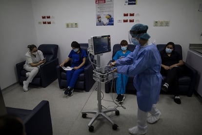 Medical personnel in observation after being vaccinated at La Samaritana University Hospital in Zipaquirá, Colombia. 