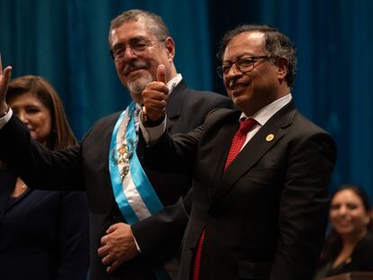 Gustavo Petro and Bernardo Arévalo wave after the swearing-in ceremony in Guatemala, January 14, 2024.