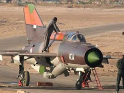 A handout picture obtained from Ammon News and supplied by Syrian activists shows the Syrian air force Russian-made MiG-21 plane that a pilot landed with in the King Hussein military base in Mafraq in northern Jordan on June 21, 2012. Jordan granted political asylum to the Syrian pilot, identified by Syrian authories as Colonel Hassan Merei al-Hamade, hours after he landed his jet in the base, in the first such defection in the 15-month Syrian revolt. AFP PHOTO/HO/AMMON NEWS ==  RESTRICTED TO EDITORIAL USE - MANDATORY CREDIT &quot;AFP PHOTO / HO / AMMON NEWS &quot; - NO MARKETING NO ADVERTISING CAMPAIGNS - DISTRIBUTED AS A SERVICE TO CLIENTS  ==