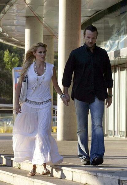 Carlos Moyá y Carolina Cerezuela acuden al concierto de U2 en el Camp Nou en junio de 2009