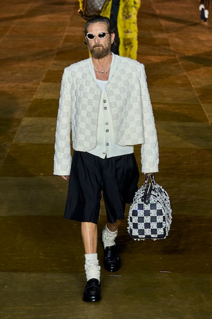 Designer Stefano Pilati wears a Speedy, by Louis Vuitton.