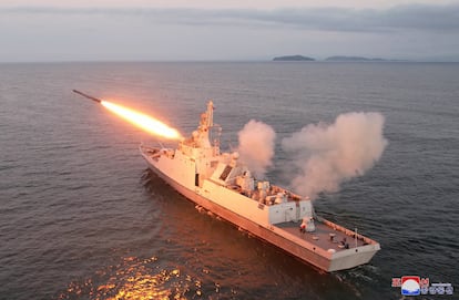 North Korean leader Kim Jong-un oversees a strategic cruise missile test aboard a navy warship in this undated photo released by North Korea's Korean Central News Agency (KCNA).