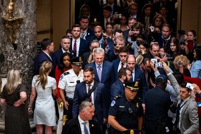 Kevin McCarthy, center, walks back to his office after the House of Representatives voted to remove him as speaker on Tuesday, October 3.