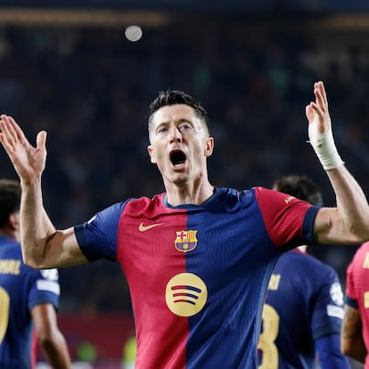 Barcelona's Robert Lewandowski celebrates after scoring his side's third goal during the Champions League quarterfinals first leg soccer match between Barcelona and Borussia Dortmund, at the Lluis Companys Olympic stadium in Barcelona, Spain, Wednesday, April 9, 2025. (AP Photo/Joan Monfort)