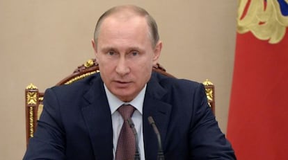 Vladimir Putin durante uma sessão do Kremlin