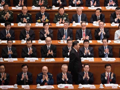 Aplausos al presidente chino Xi Jinping tras un discurso. 
