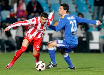 Reyes y Marcano, durante el partido de hoy.