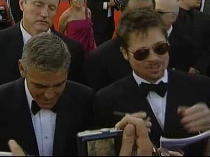 Pitt y Clooney acaparan la atención en la Mostra