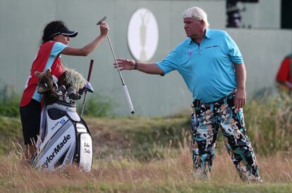 John Daly y su caddie Anna Cladakis.