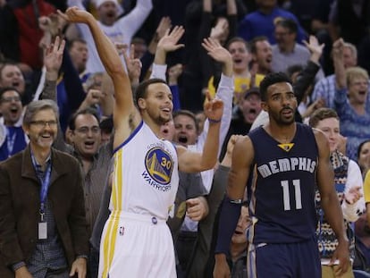 Curry celebra un triple ante Conley.