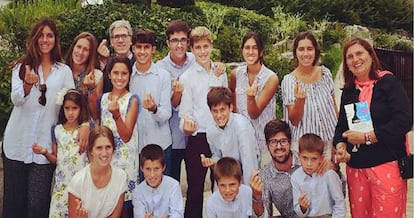 Postigo (back row, third from left) with his family.