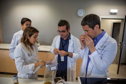 Arboleya and Dani Lasa, in a kitchen at the Basque Culinary Center, with two students.