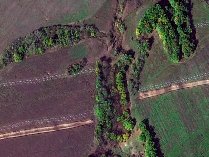 White rows of anti-tank dragon's teeth erected by Wagner Group mercenaries on the Ukrainian front line, in a satellite image taken in 2022.