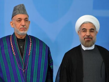 Hamid Karzai, presidente de Afganistán (izquierda) y el presidente de Irán, Hasan Rouhaní.