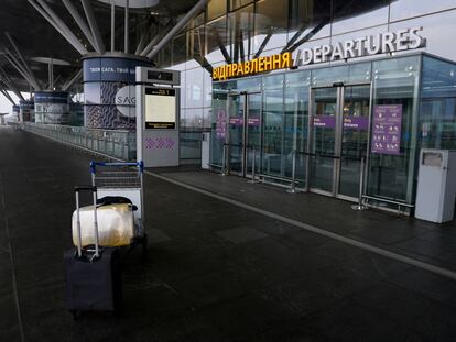 Luggage is left abandoned in the departure terminal of Boryspil International Airport, in Kyiv, following the invasion of Ukraine by Russia, on February 24, 2022.