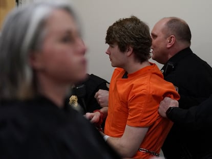 Tops gunman Payton Gendron is whisked out of the courtroom following an outburst by a man who was restrained and removed from the courtroom after lunging towards Gendron during sentencing in his guilty plea to 15 counts.