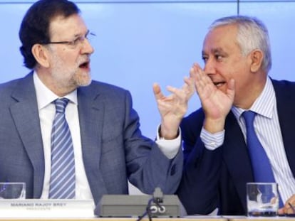 Mariano Rajoy y Javier Arenas, en junio pasado.