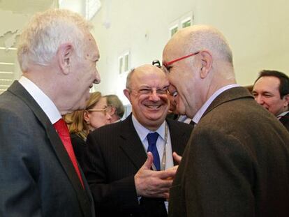 José Manuel García-Margallo con el dirigente de Unió Josep Antoni Duran i Lleida, en presencia del eurodiputado del PP Santiago Fisas.