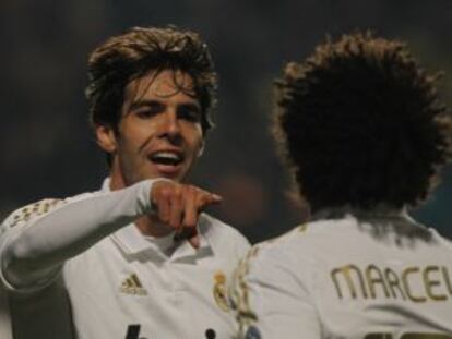 Bench mates: Kaká thanks fellow substitute Marcelo for his assist