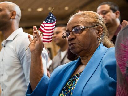 Carmen Mateo, originally from the Dominican Republic, takes part in a U.S. naturalization ceremony in New York, in a file photo.