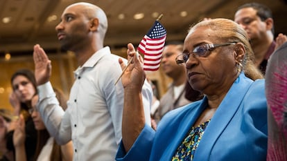 Carmen Mateo, originally from the Dominican Republic, takes part in a U.S. naturalization ceremony in New York, in a file photo.