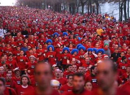 Corredores en la San Silvestre vallecana, que cada año tiene una participación mayor.