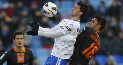 Postiga, frente a Victor Ruiz en un partido del pasado curso