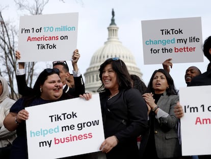 A group of TikTokers demonstrates in front of Capitol Hill on Wednesday, the day Congress voted to force the sale of the social network.